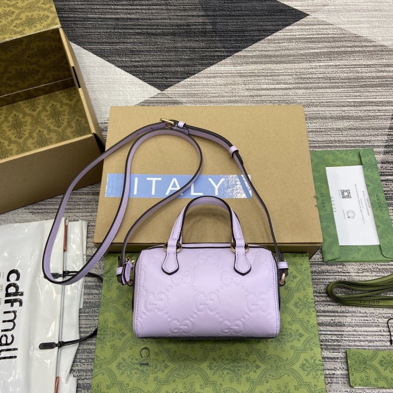 G*u*i top handle bags